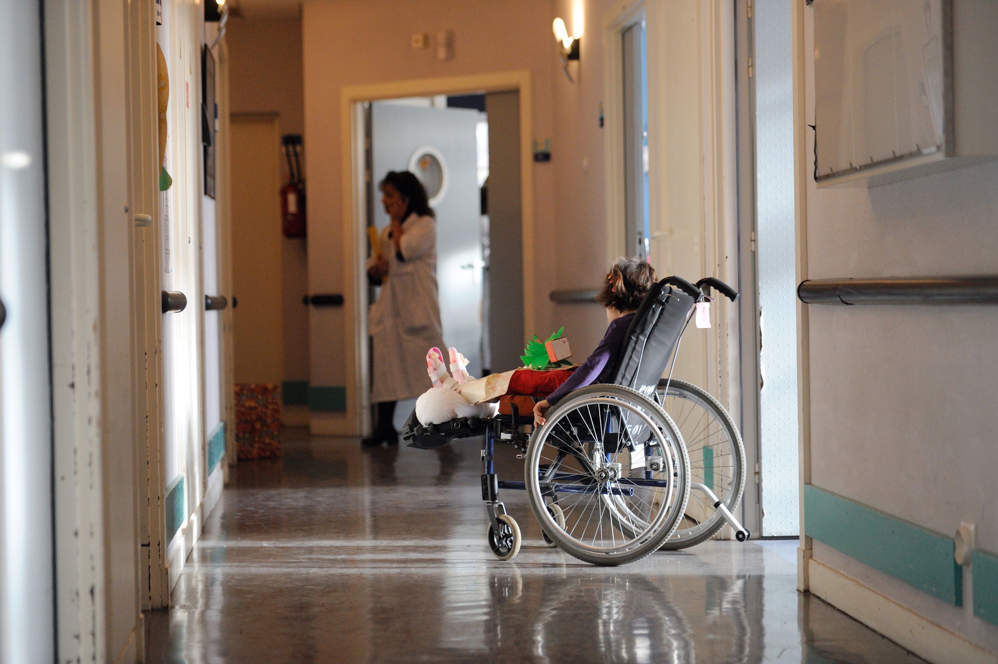 Disable embeds. Wheelchair diaper. disabled children. disabled wheelchair milan. wheelchair patient kid.